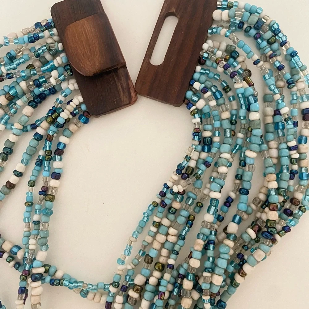 Unique Vintage Aqua Blue and White Beaded Necklace with carved wood clasp - Picture 7 of 9
